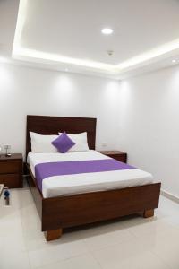 Postel nebo postele na pokoji v ubytování Cataleya Hotel