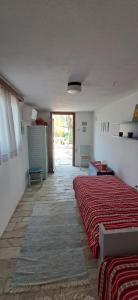 Postel nebo postele na pokoji v ubytování VILLA IMELDA