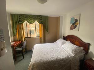 Postel nebo postele na pokoji v ubytování Hostal Pucará + 37 fotografií