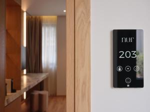 a close up of a door with a sign on it at Nur City Suites in Athens