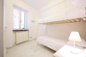 Katil atau katil-katil dalam bilik di Le Mura - Riviera Apartments