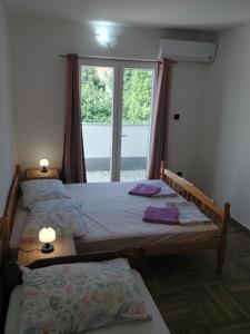 Postel nebo postele na pokoji v ubytování Croatia Apartman Masa