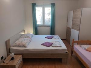 Postel nebo postele na pokoji v ubytování Croatia Apartman Masa