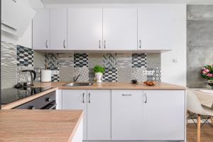 Dapur atau dapur kecil di Lumina bright apartments in Warsaw +14 gambar