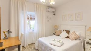 Posteľ alebo postele v izbe v ubytovaní Casa Rural Casa Mama Encinarejo by Ruralidays