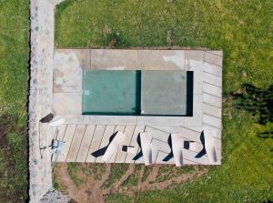 an overhead view of a swimming pool in a yard at Rocas del Plata in Potrerillos