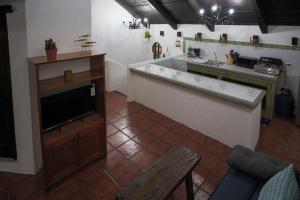 Η κουζίνα ή μικρή κουζίνα στο Colonial flat with Parking Terrace Netflix