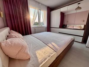 Postel nebo postele na pokoji v ubytování Poco Beach Studio