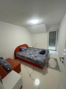 Postel nebo postele na pokoji v ubytování Apartman Holiday