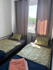 Postel nebo postele na pokoji v ubytování Mieszkanie wakacyjne Ustka