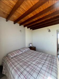 Ένα ή περισσότερα κρεβάτια σε δωμάτιο στο Cantinho céu na terra