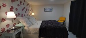 En eller flere senge i et værelse på Magnifique appartement