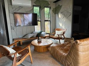 Μια τηλεόραση ή/και κέντρο ψυχαγωγίας στο Bangalo da Agua