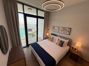 Postel nebo postele na pokoji v ubytování Maryah Island Luxe 1 Bed Junior by Central Stay + 41 fotografií