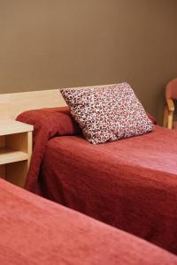 Posteľ alebo postele v izbe v ubytovaní Hotel Anna