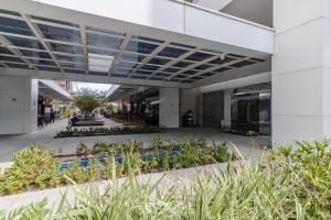 a view of therium of a building with plants at Edifício Metropolitan Barcelona - Jardim Goias - MBC in Goiânia