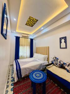 Letto o letti in una camera di Hôtel Koutoubia