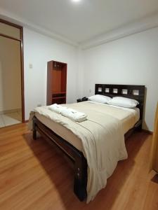 Ένα ή περισσότερα κρεβάτια σε δωμάτιο στο Hostal Atacama