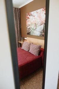 Posteľ alebo postele v izbe v ubytovaní Hotel Anna
