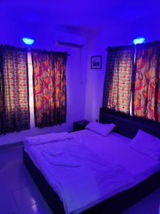 Uma cama ou camas num quarto em Epa's Place