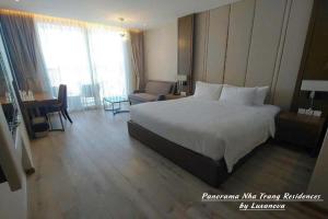 Panorama Nha Trang Residences by Luxanova客房内的一张或多张床位