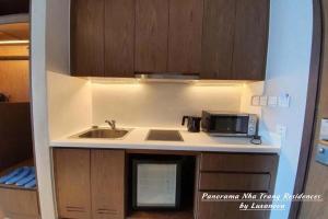 Panorama Nha Trang Residences by Luxanova的厨房或小厨房