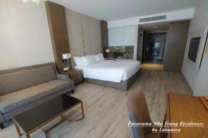 Panorama Nha Trang Residences by Luxanova客房内的一张或多张床位