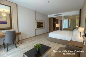 Panorama Nha Trang Residences by Luxanova客房内的一张或多张床位