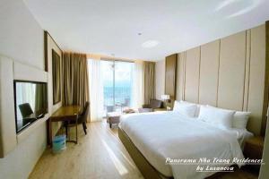 Panorama Nha Trang Residences by Luxanova客房内的一张或多张床位