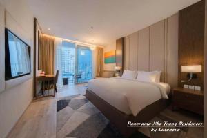 Panorama Nha Trang Residences by Luxanova客房内的一张或多张床位