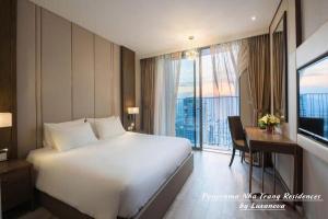 Panorama Nha Trang Residences by Luxanova客房内的一张或多张床位