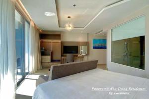 Panorama Nha Trang Residences by Luxanova客房内的一张或多张床位