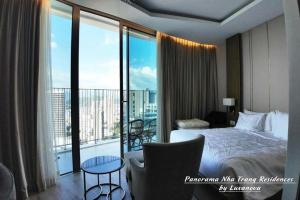 Panorama Nha Trang Residences by Luxanova客房内的一张或多张床位