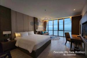 Panorama Nha Trang Residences by Luxanova客房内的一张或多张床位