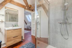 a bathroom with a shower and a sink at La Roseraie - Disney 30 minutes in Saint-Augustin +80 photos