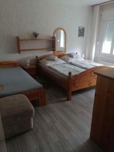 Posteľ alebo postele v izbe v ubytovaní Holiday home in Balatonföldvar 36529