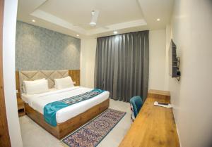 Postel nebo postele na pokoji v ubytování Hotel Marine House