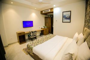 TV a/nebo společenská místnost v ubytování Hotel Marine House