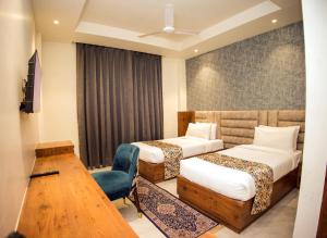 Postel nebo postele na pokoji v ubytování Hotel Marine House