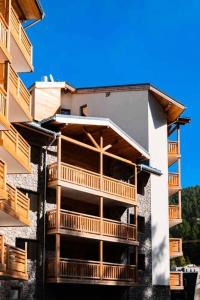 a building with balconies on the side of it at Appartement 2 Pièces 4 Personnes MAE-3913 in Vars