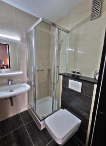 Ein Badezimmer in der Unterkunft Concorde Hotel Ascot