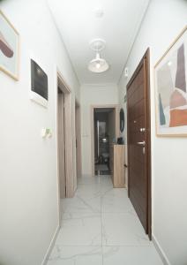 Televízia a/alebo spoločenská miestnosť v ubytovaní Cozy Sea View Apartment in Paralia