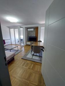 Postel nebo postele na pokoji v ubytování Golden view apartman