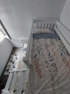 Postel nebo postele na pokoji v ubytování Golden view apartman