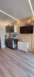Η κουζίνα ή μικρή κουζίνα στο Maison de jardin 4 personnes