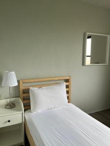 Postel nebo postele na pokoji v ubytování 燕寓 獨旅單人房Swallow Coliving