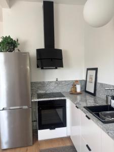 Η κουζίνα ή μικρή κουζίνα στο Apartament Loft & Go +4 φωτογραφίες