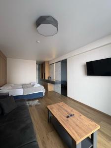 Katil atau katil-katil dalam bilik di Go-Gudauri The Atrium Residence