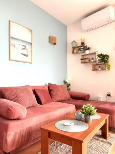 Et opholdsområde på Sunny Paradise Apartment