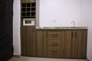 Kuchyň nebo kuchyňský kout v ubytování Serviced Apartment Direct